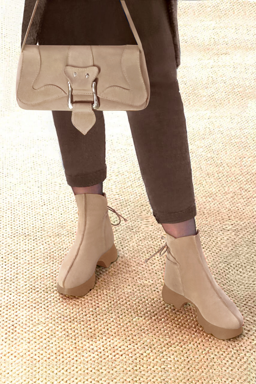French elegance and refinement for these tan beige dress booties with laces at the back, 
                available in many subtle leather and colour combinations. This charming ankle boot with its back lacing fits snugly around the ankle.
Its rubber sole ensures comfort and originality.
Customise or not, with your choice of materials and colours.  
                Matching clutches for parties, ceremonies and weddings.   
                You can customize these lace-up ankle boots to perfectly match your tastes or needs, and have a unique model.  
                Choice of leathers, colours, knots and heels. 
                Wide range of materials and shades carefully chosen.  
                Rich collection of flat, low, mid and high heels.  
                Small and large shoe sizes - Florence KOOIJMAN